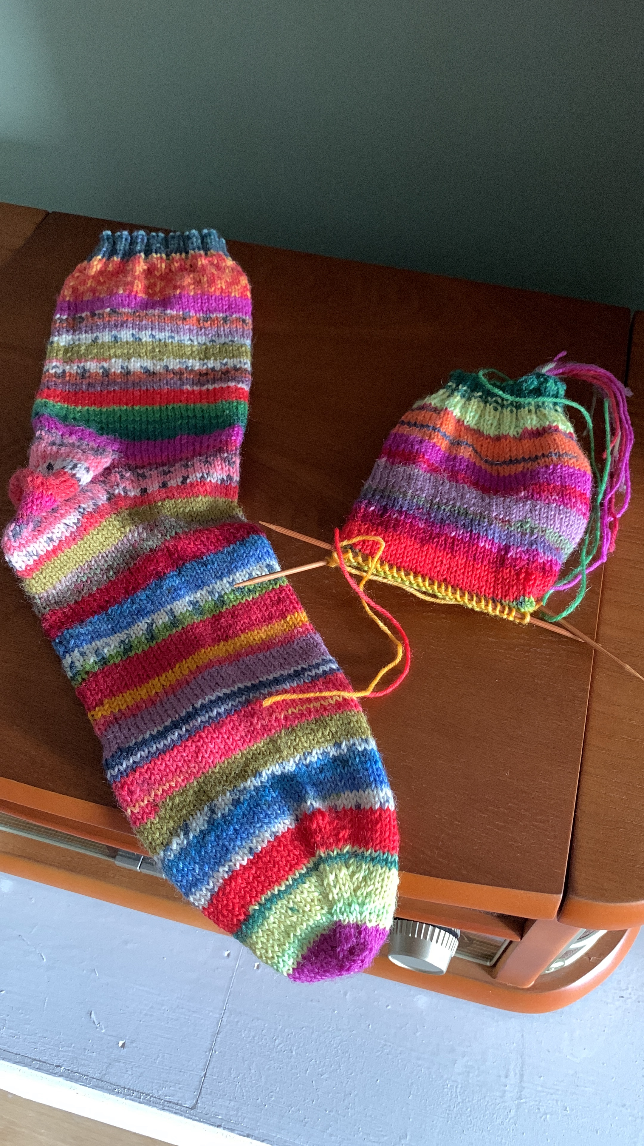 1 and half hand knitted socks in lots of colours and patterns
