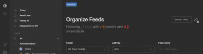 Feedly OPML export arrow is shown